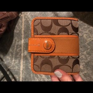 Authentic orange coach wallet